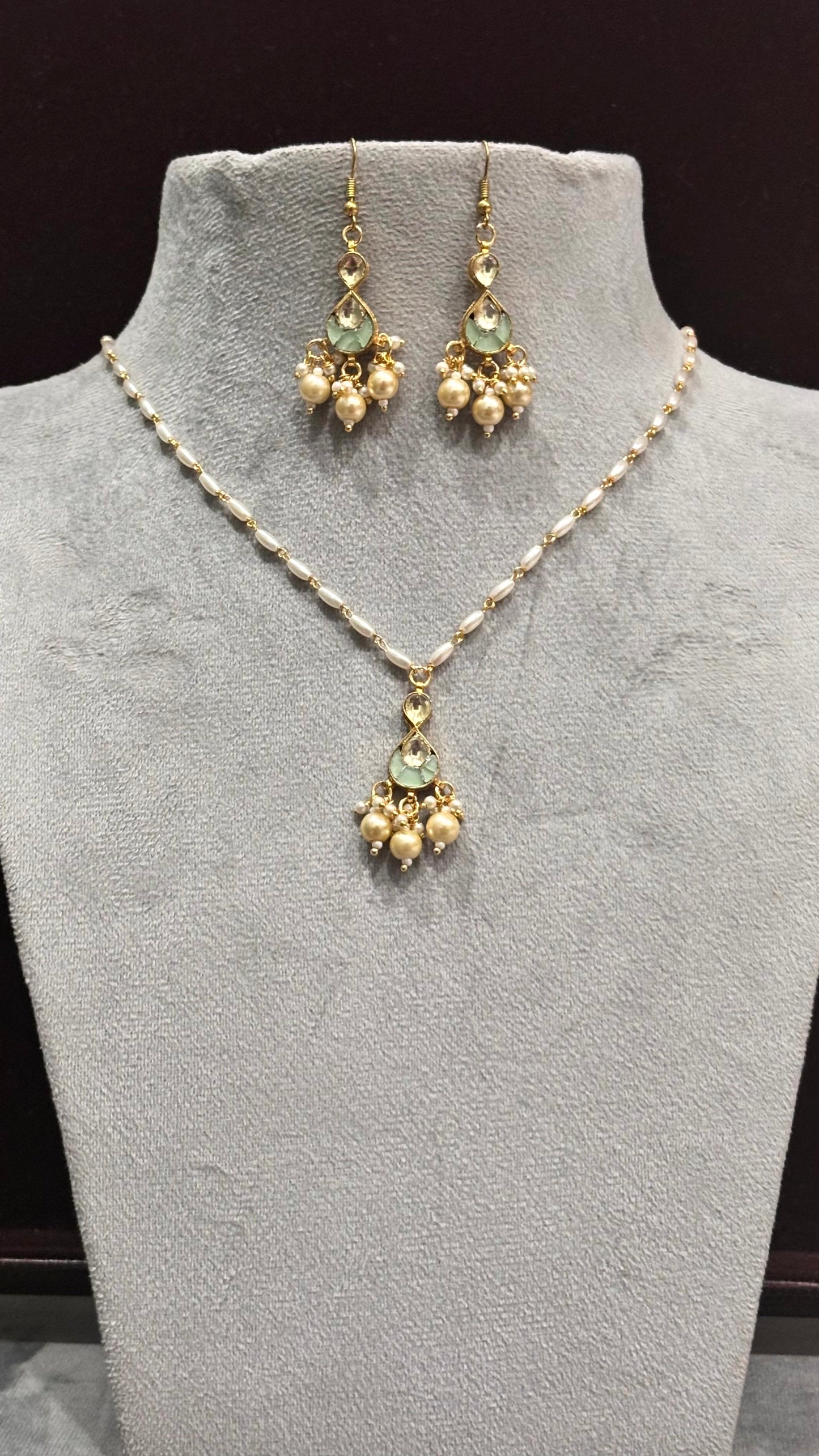 Ira Pearl Pachi Kundan Pendant Necklace Set