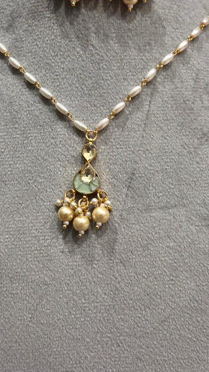 Ira Pearl Pachi Kundan Pendant Necklace Set